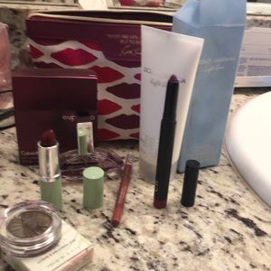 Makeup bag with makeup and perfume